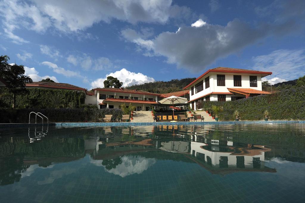 Amritara Ambatty Greens Resort Virajpet Eksteriør bilde